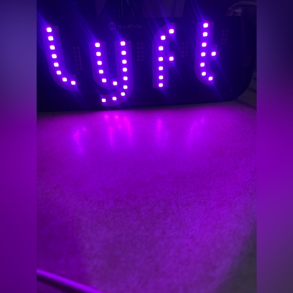 Lyft pink sign light